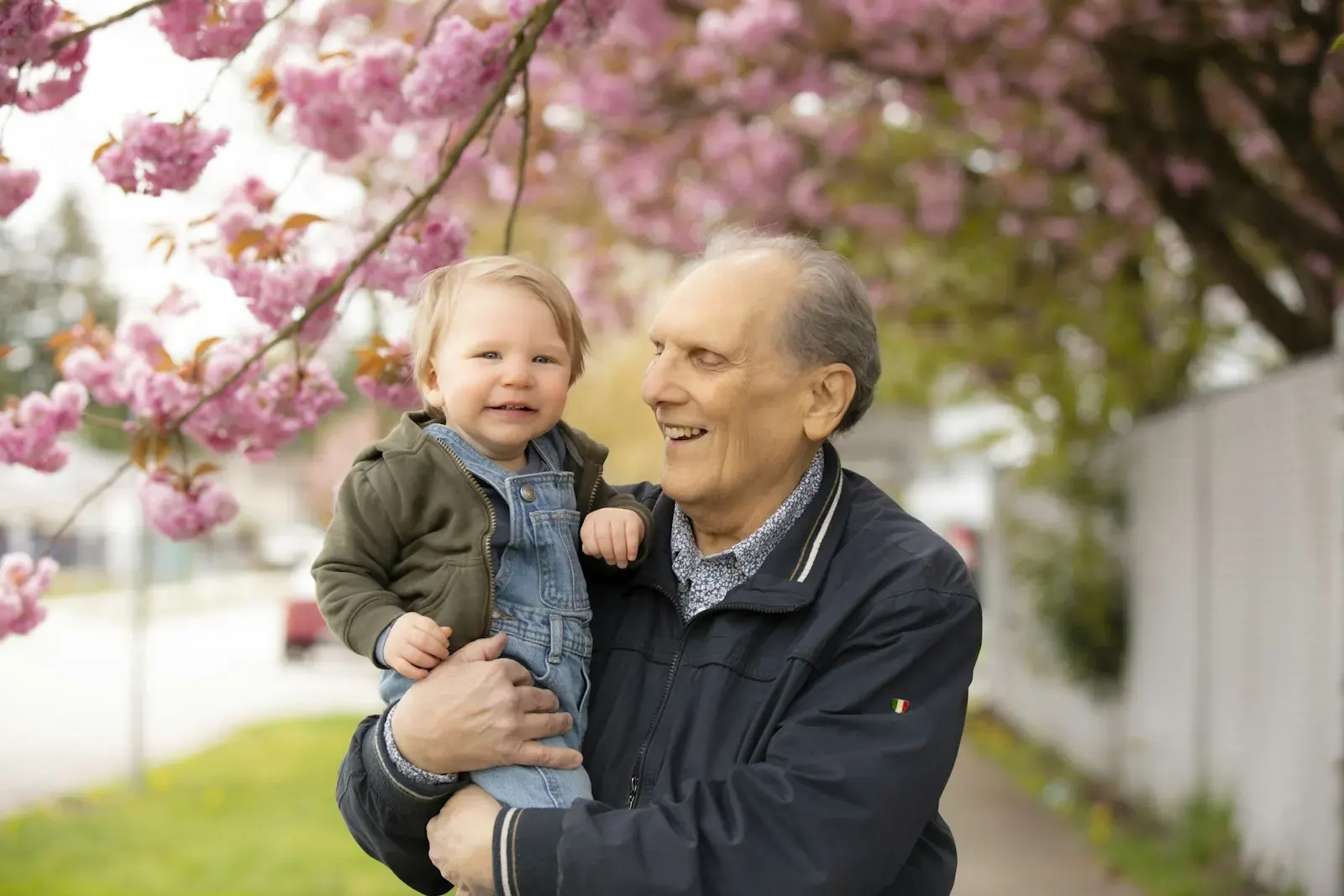 Grandfather with his grandson outdoors